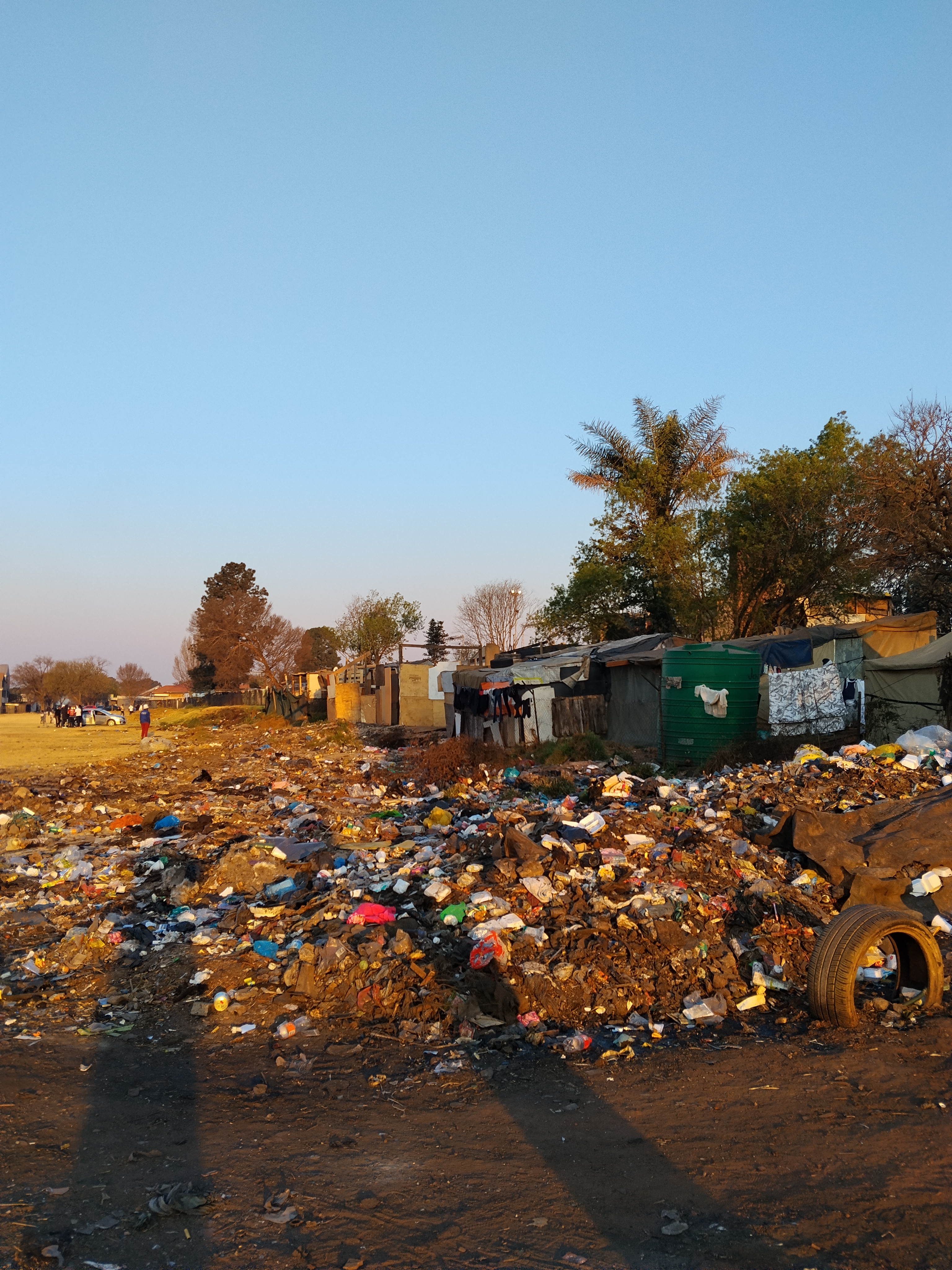 Refuse piled up near the settlement